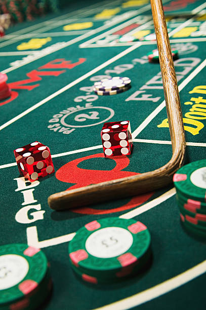 Auto Roulette interface showing spin counter and stake settings